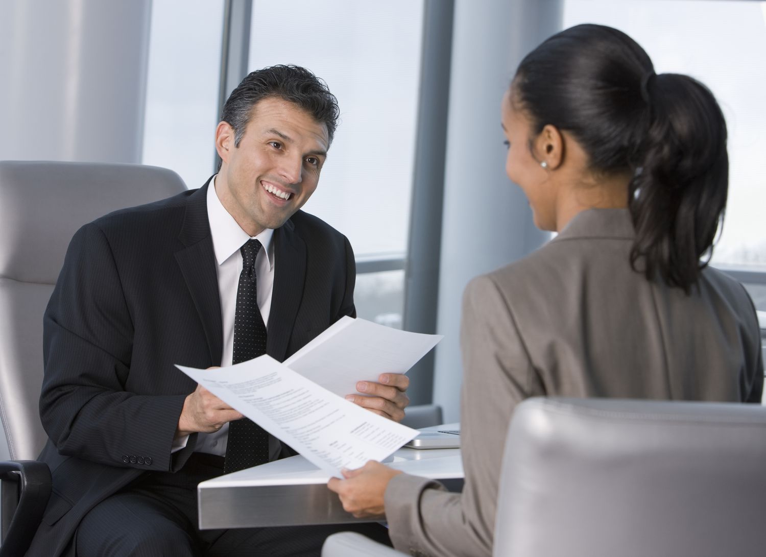Woman interviewing a financial advisor
