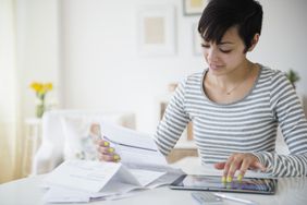 Young woman doing accounting