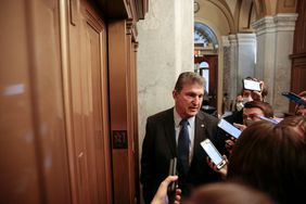 Sen. Joe Manchin (D-WV) speaks to reporters as he leaves the Senate Chambers following a vote on December 15, 2021 in Washington, DC. The Senate voted to pass the National Defense Authorization Act, which sends the bill to the desk of U.S. President Joe Biden.