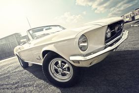 Classic white Ford Mustang convertible