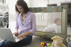 Mom With Laptop and Baby
