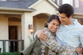 A soldier celebrates closing on a new home