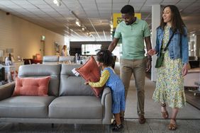 A family shops for new furniture.