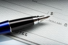 Close-up of pen on a check
