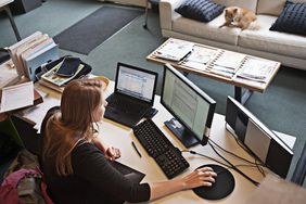 Overview of woman in her home office setting