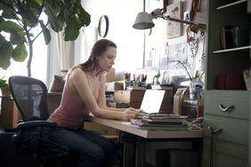 Woman working from home office