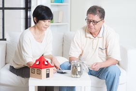 Homeowners deliberate over money together
