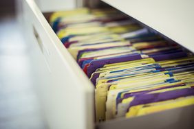 Multicolor files in a clinic drawer