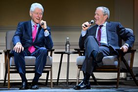 Former Presidents Bill Clinton and George W. Bush speak onstage