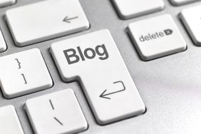 Image of a Keyboard that Reads "Blog"
